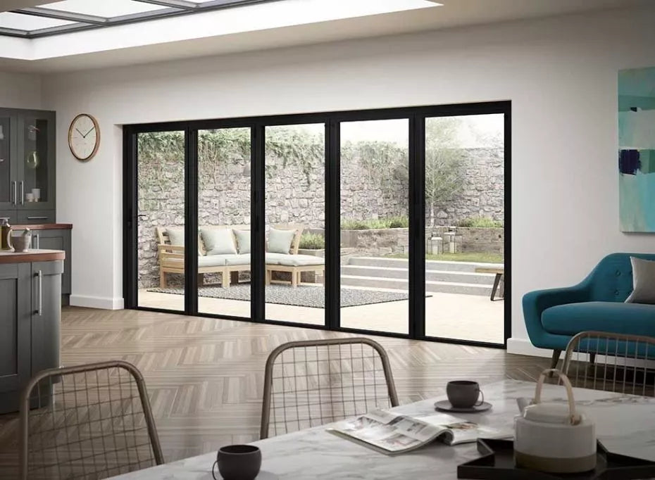 5 panel bifold door connecting a kitchen and patio